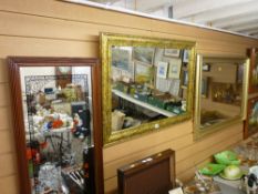 Two good gilt framed wall mirrors and a mirror with lady decoration and the word 'Summer'