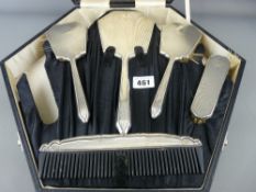 Cased five piece silver dressing table set of hand mirror, three brushes and comb (one further brush