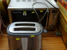 Silver finished Russell Hobbs microwave oven and a Prestige toaster E/T