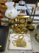 Parcel of brassware including fire irons, mantel clock, oil lamp etc