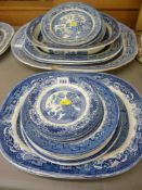 Five Willow patterned meat platters, a large rectangular bowl and twenty three various Willow