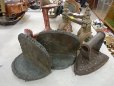 Pair of vintage fire dogs, a pair of bronze bookends/door stops with monogrammed details along