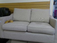 Stone coloured compact couch