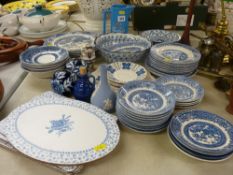 Quantity of Willow pattern blue and white tableware, a pottery advertising water jug etc