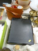 Vintage cased binoculars and a leather bound family Bible