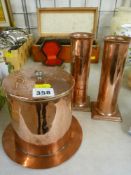 Cylindrical copper tobacco box and a pair of vases