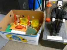 Box of toys including Frankenstein model