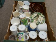 Selection of pottery and china mugs, a Masons Chartreuse cup and saucer, a Poole pottery hand