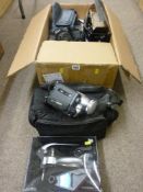 Canon EOS 1000 Camera, a Panasonic digital video camera, both with carry cases and mixed