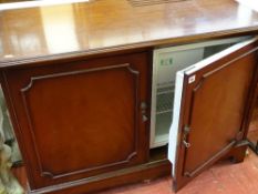 Two door polished wood effect cabinet with interior Electrolux fridge E/T