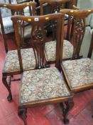 Set of four floral pad upholstered high back dining chairs