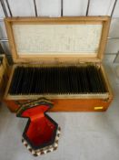 Vintage lidded box of glass photographic negatives and a modern decorative trinket box