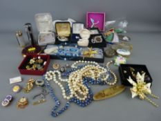 Quantity of costume jewellery, badges and other collectables