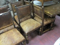 Refectory style draw leaf dining table and six leather and stud upholstered dining chairs