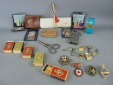 Collection of badges and cufflinks, a quantity of Cunard Queen Mary matchboxes, a miniature bottle