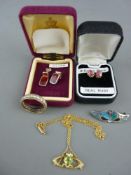 Fifteen carat gold peridot and seed pearl set pendant necklace, a nine carat gold paste set eternity