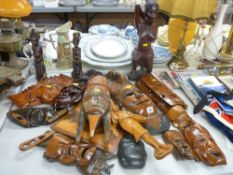 Quantity of carved wooden tribal masks, figures and ornaments