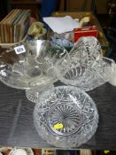 Cut glass flower basket, a wide collared vase and a shallow bowl