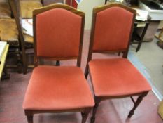 Pair of red velour upholstered dining chairs