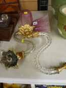 Pair of Victorian wall lights with gilt metal mounts, shaped cut glass arms and cranberry tinted