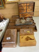 Four vintage wooden desk tidies, three carved and inlaid boxes, an Oriental inlaid desk chest and an
