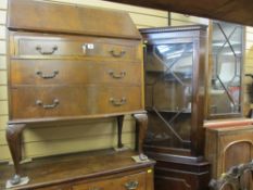 Mahogany three drawer bow front bureau, standing corner cupboard and a wall hanging corner cupboard