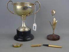 Silver presentation trophy cup on stand, a Continental rose on stand, a gold plated Parker pen and a
