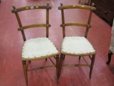 Pair of oak floral and stud upholstered bedroom chairs