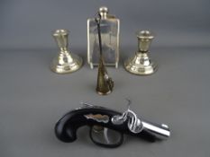 Silver hip flask and two squat candlesticks, a plated candle snuffer and a vintage flintlock