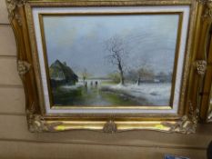 MAX BRANDRETT gilt framed oil on board - thatched cottage and figures on a frozen pond, 29 x 39 cms