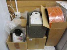 Two still packaged Woodstone For Life reconstituted stone birdboxes and a small boxed BBQ