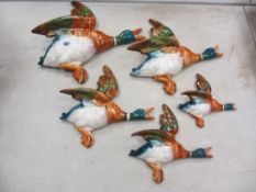 Set of five Beswick flying ducks