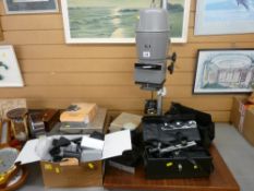 Vintage photographic enlarger by MPP, a cased Nikon Macro speed light along with other