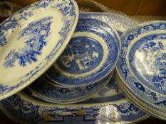 Box of Willow pattern etc dresser plates and platters