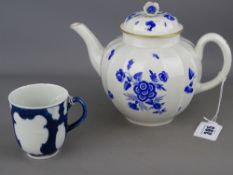 First period Worcester James Giles dry blue decorated teapot and a part decorated cup with blue
