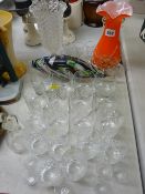 Group of cut and other drinking glassware, a vintage glass fish ornament, celery vase etc