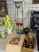 Two modern metalware and glass displays, a collection of drinks miniatures, a boxed casserole dish