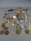 Selection of lady's and gent's wristwatches with a small selection of vintage coinage and a pocket
