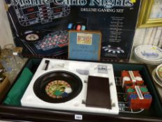 Boxed 'Monte Carlo Night's Deluxe Gaming Set' and a vintage GWR wooden jigsaw puzzle (unchecked)