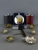 Four modern hip flasks, an EP wine tasting cup, five white metal lidded salt pots with blue glass