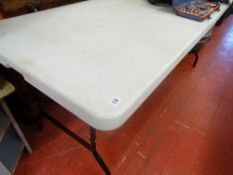 Two plastic and metal folding tables
