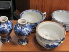 Vintage chamber pots and a pair of blue and white bulbous vases