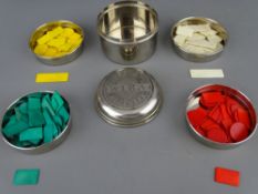 Vintage Wira patent necessaire containing four Petri dishes of stained bone games counters