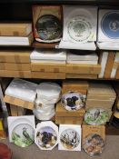 Large quantity of Bradford Exchange collector's plates to include a Millennium commemorative plate