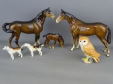 Two brown Beswick horses and a foal, a model of an owl and two hunting hounds, all with Beswick