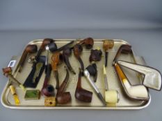 Collection of vintage tobacco pipes, two cleaners/tampers etc