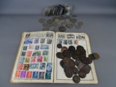 Wanderer album of vintage world postage stamps with a collection of pre-decimal and later coinage
