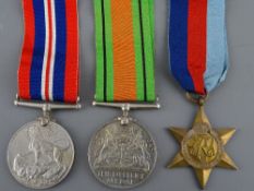 World War II group of three unmarked including the '39-45 Star, War and Defence medals