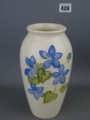 Moorcroft pottery floral decorated vase, 19 cms high