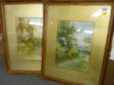 ARTHUR ASHDOWN BOX watercolours, a pair - depicting swans on a tree lined river and a woman on a